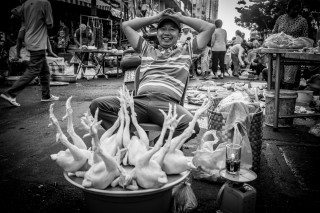 Chicken Man by Graeme Heckels Saigon Street Photography, Vietnam