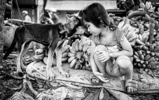 Kiss, Girl & her Dog by Graeme Heckels Saigon Street Photography, Vietnam