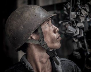 Portrait of a soldier by Graeme Heckels Saigon Street Photography, Vietnam