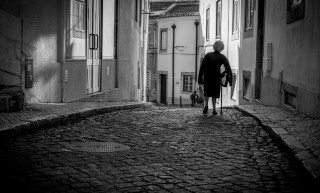 Old Lady Strolling in Lisbon by Graeme Heckels Travel & Street Photography
