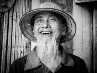 Black and White photo by Graeme Heckels Hanoi Street Photography Uncle